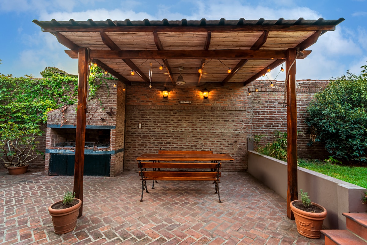Cedar pergola over a backyard patio
